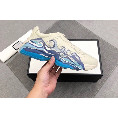 Mens and Womens Gucci Rhyton leather sneaker with wave