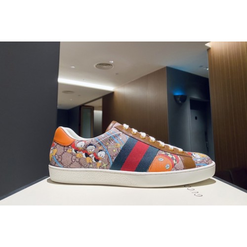 Gucci Mens Disney x Gucci Donald Duck Ace sneaker in Beige and ebony Supreme canvas Gucci Mens Disney x Gucci Donald Duck Ace sneaker in Beige and ebony Supreme canvas